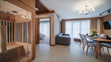 Apartamento (H 2 with Sauna) | Zona de estar | Una televisión de pantalla plana