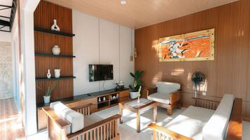 Standard Villa, Balcony, Pool View | Living area