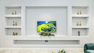Habitación triple Deluxe | Interior