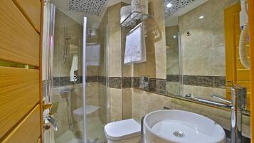 Shower, hair dryer, slippers, towels