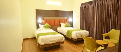 Habitación ejecutiva con 2 camas individuales | Camas extra, wifi gratis y ropa de cama