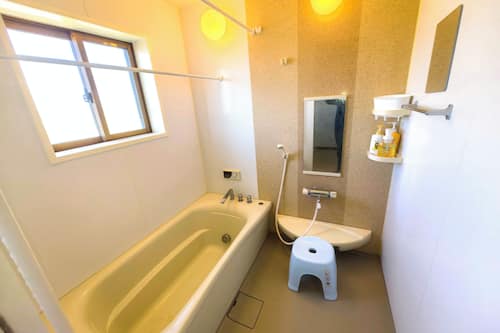 Deluxe House, Balcony, Garden View | Bathroom | Slippers