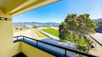 Deluxe House, Balcony, Garden View | Property grounds