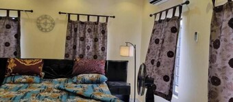 Charming Executive Suite with Garden Views at AJALA Lodge, Badagry