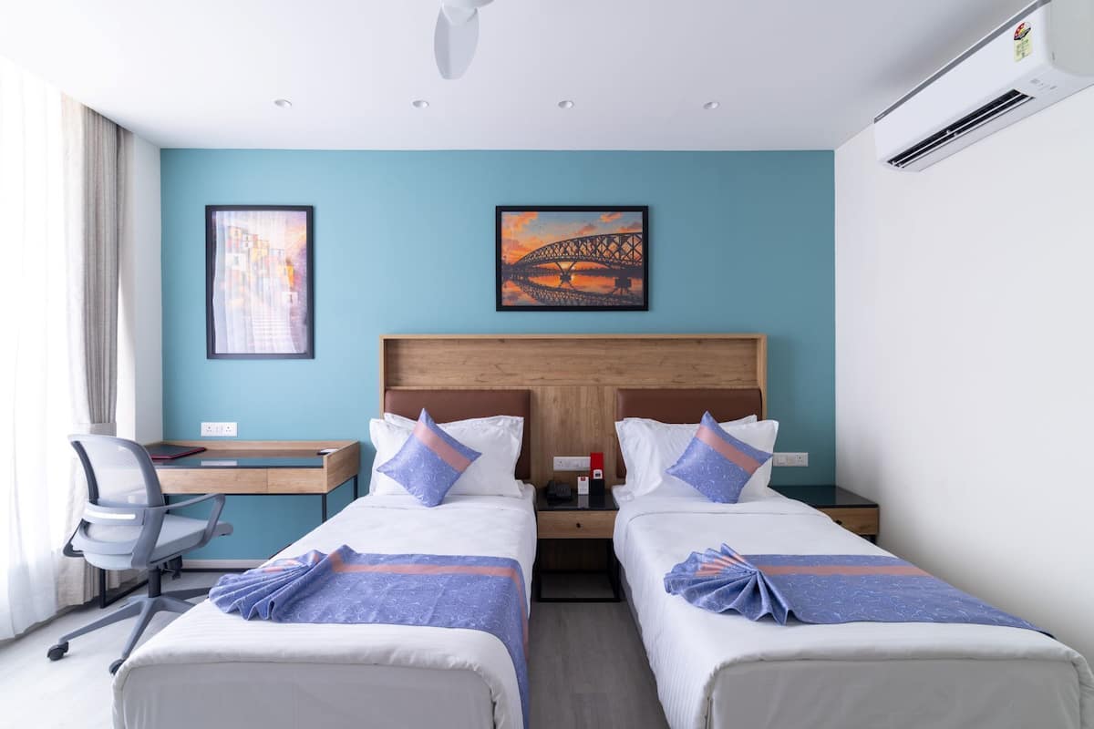 Deluxe Double or Twin Room, City View | Hypo-allergenic bedding available, desk, laptop workspace, WiFi (free)