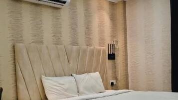 Deluxe Double Room, City View | In-room safe, desk, laptop workspace, soundproofing