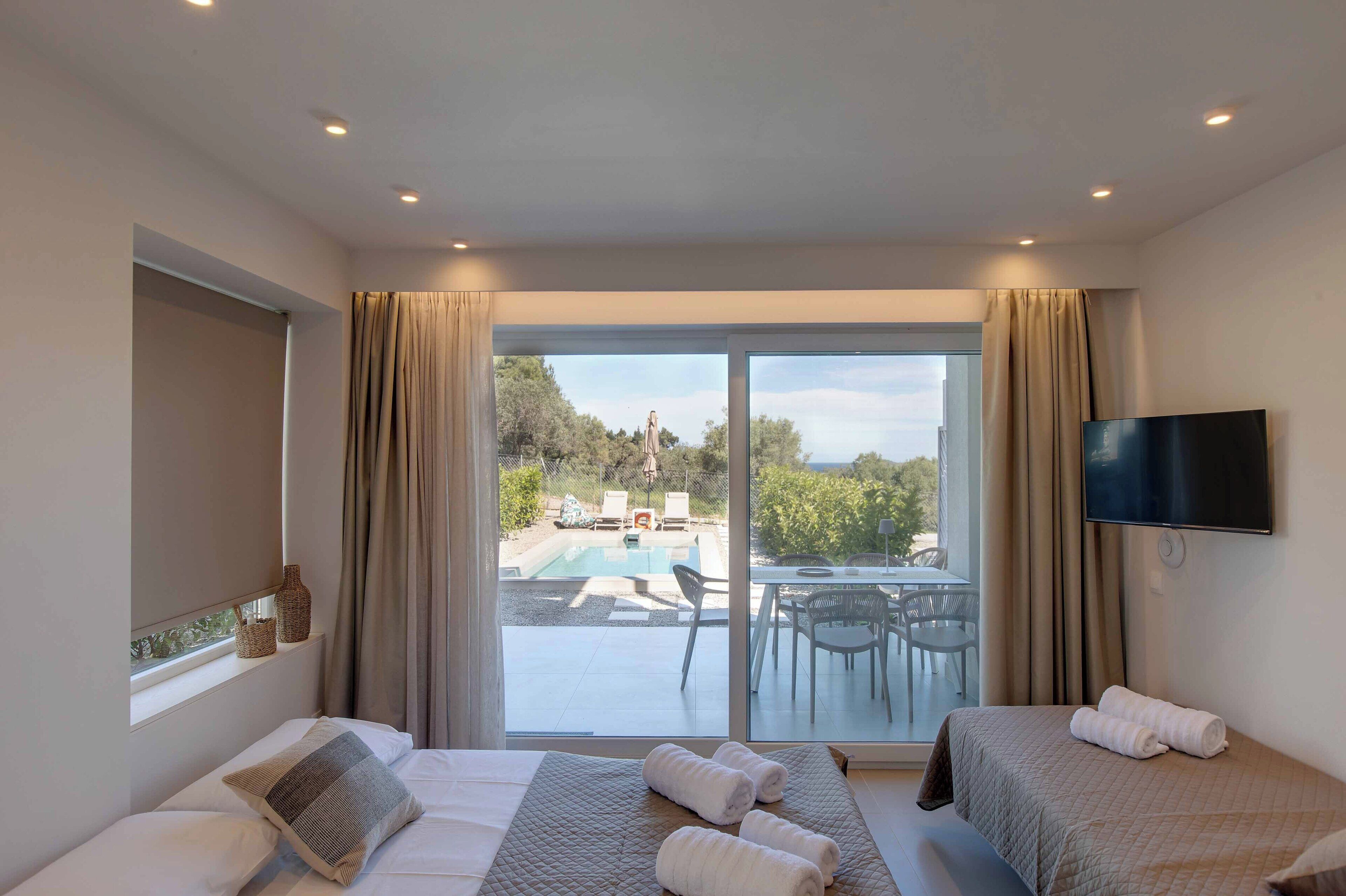Deluxe-villa - udsigt til pool | Ekstra senge