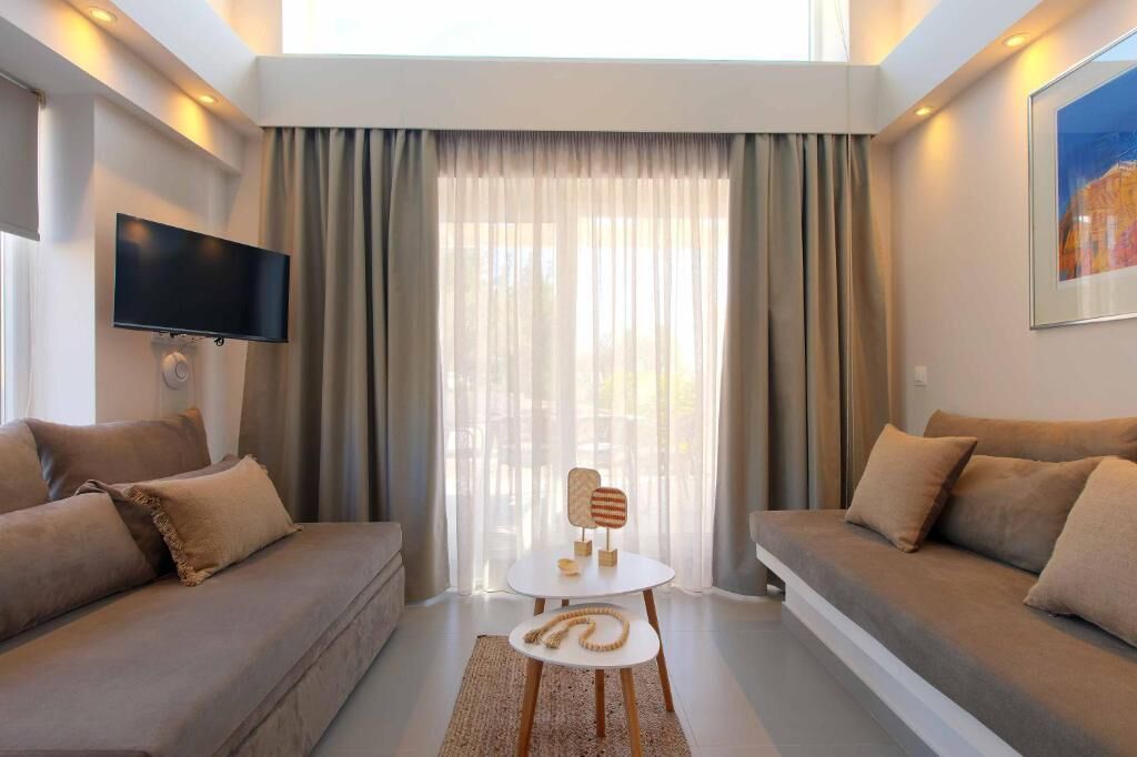 Villa, balcon, vue partielle sur la mer | Coin séjour