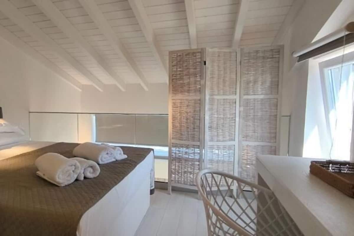 Luksushuvila, parveke, näköala puutarhaan