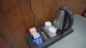 Deluxe villa, uitzicht op tuin | Koffie en/of koffiezetapparaat