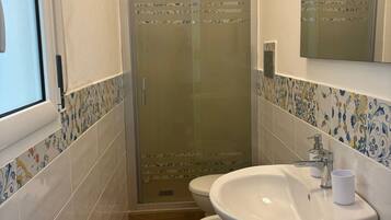 Comfort Apartment, Pool View | Bathroom | Shower, hair dryer, towels, soap