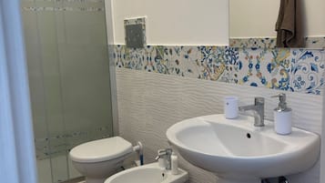 Comfort Apartment, Pool View | Bathroom | Shower, hair dryer, towels, soap