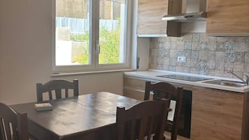 Appartamento Comfort, vista piscina | Ristoranti