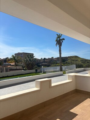 Departamento Confort, vista a la alberca | Terraza o patio