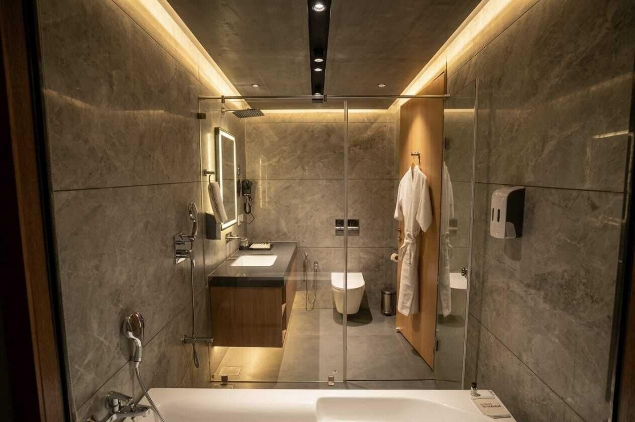 Separate bathtub and shower, free toiletries, hair dryer, slippers