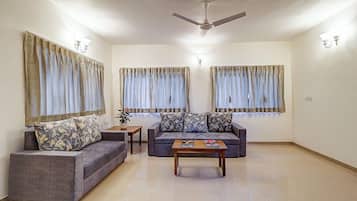 Deluxe Villa, Balcony | Living area