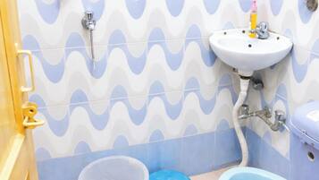 Shower, rainfall showerhead, slippers, towels