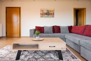 Appartement Deluxe, balcon, vue sur la mer | Aire de séjour