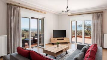 Appartement Deluxe, balcon, vue mer | Coin séjour