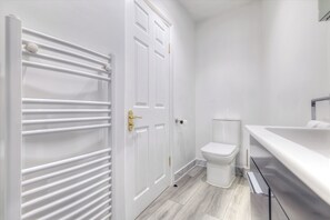 Hair dryer, towels, soap, toilet paper