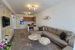 Family Apartment, 1 Bedroom, Balcony, Mountainside (Sunset Luxury Apartment /w Panoramic) | Living area - Sunset Luxury Apartment /w Panoramic Sea View (Vlorë)