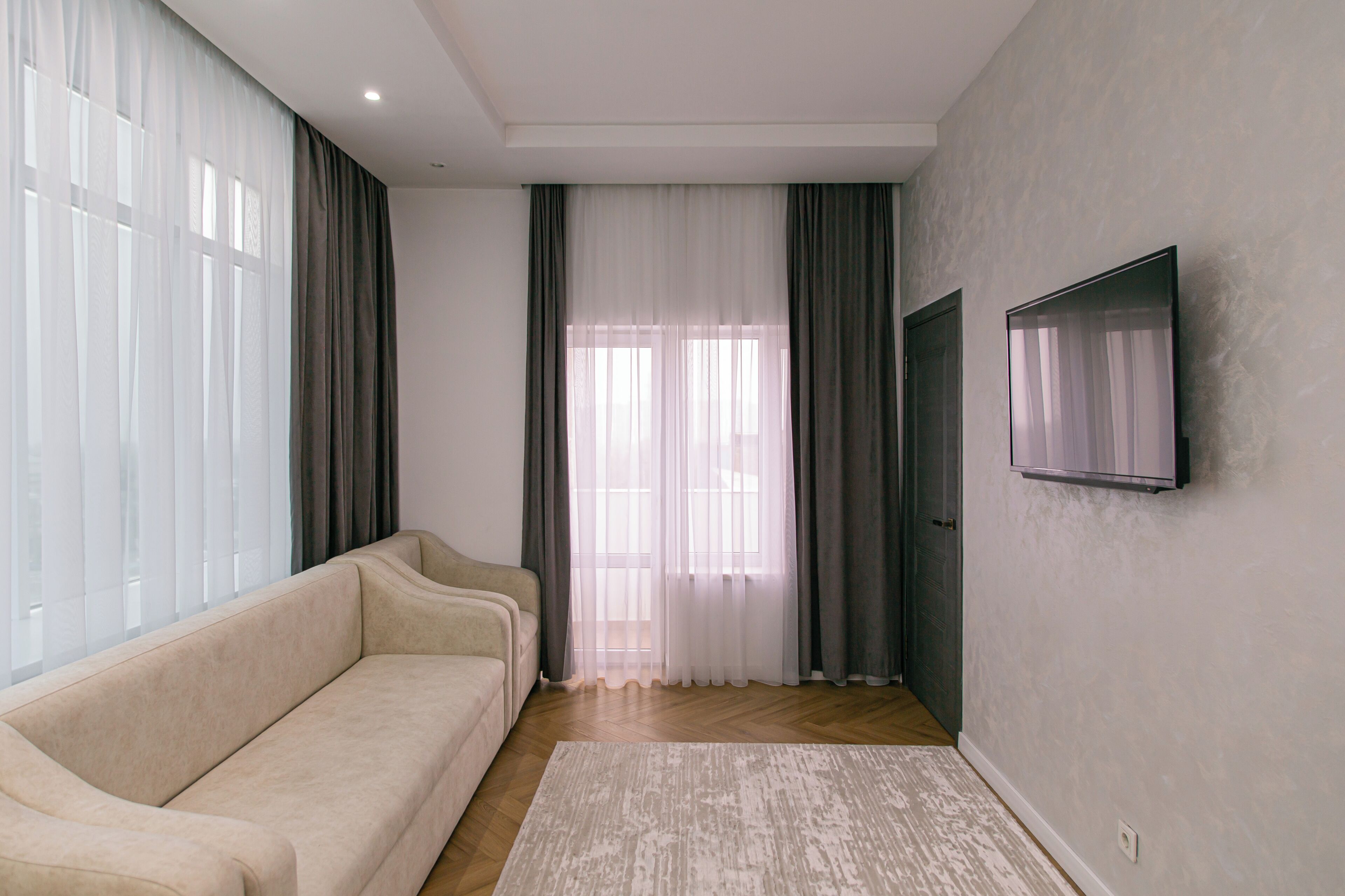 Suite júnior, balcó, vistes a la ciutat | Sala d'estar