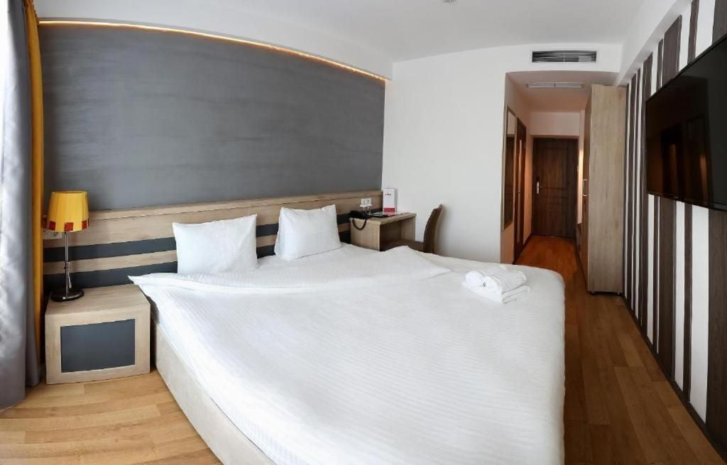 Standard Double Room, City View | In-room safe, blackout drapes, soundproofing, iron/ironing board
