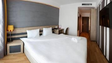 Standard Double Room, City View | In-room safe, blackout curtains, soundproofing, iron/ironing board