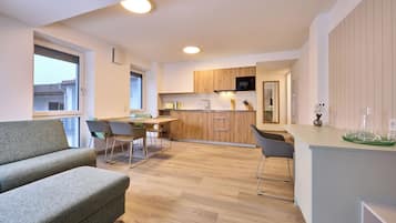 Suite Signature, 1 letto queen con divano letto, cucina | Area soggiorno