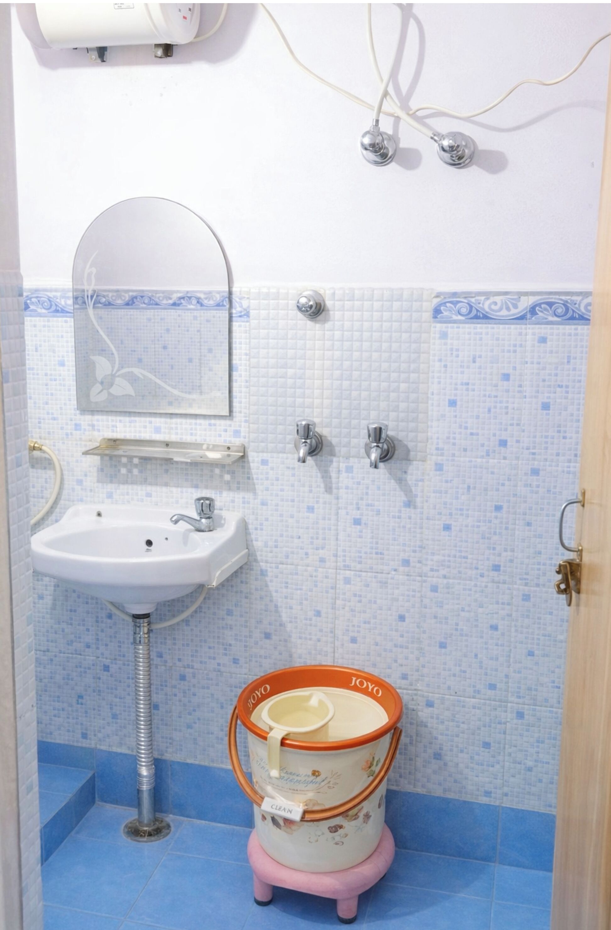 Shower, rainfall showerhead, slippers, towels