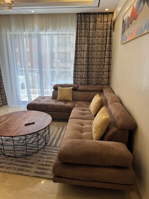 Living area - Quaint 1-bedroom condo close to the AirPort & SGR with fitness room in Nairobi (Nairobi)