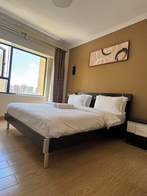 1 bedroom, iron/ironing board, WiFi, bed sheets - Quaint 1-bedroom condo close to the AirPort & SGR with fitness room in Nairobi (Nairobi)