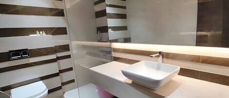 Deluxe Double Room, City View | Bathroom | Shower, free toiletries, towels, soap