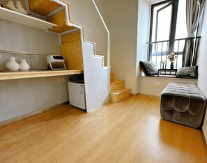 Habitación doble superior | Zona de estar