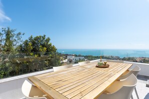 Outdoor dining - Oasis de Capellania | Panoramic Sea View Apartment with Private Pool & Terrace (Benalmádena)