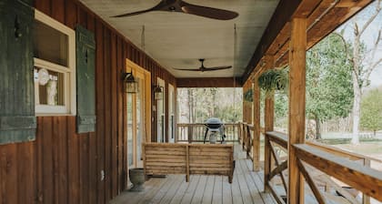 Charming cottage on 8 acres of peace & tranquility just a short drive from town.