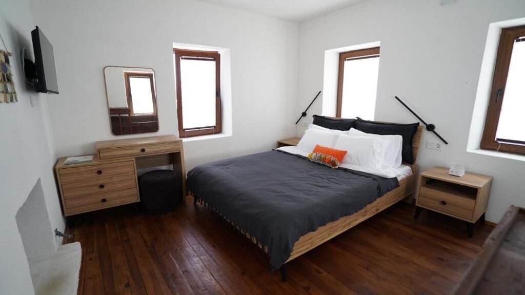 Deluxe fyrbäddsrum - utsikt mot trädgården