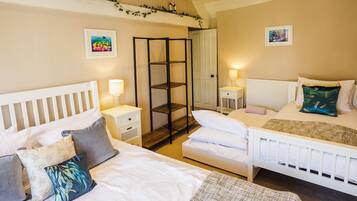 8 quartos, Wi-Fi de cortesia, individualmente decorados