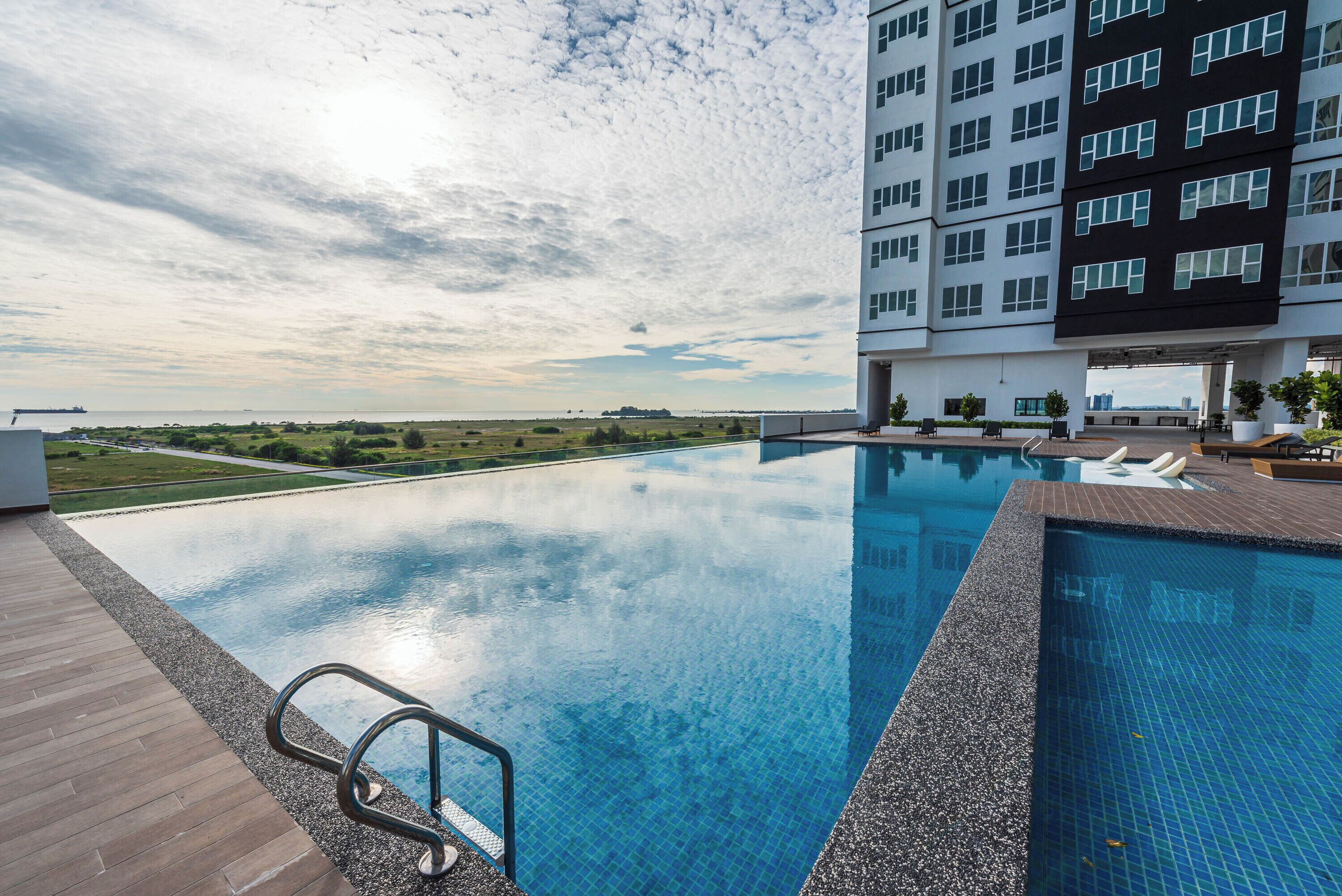 Outdoor pool, open 8:00 AM to 10:00 PM, sun loungers