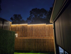 Property grounds - Designer Suite | Skylit · Work Desk · BBQ · Free Parking | 20min CBD (Bankstown)