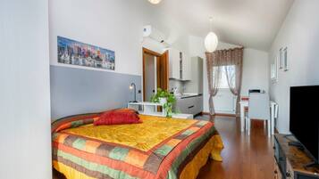 1 chambre, fer et planche Ă repasser