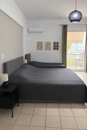 Quadruple Room, Balcony | Free WiFi - Angelika Rooms  (Messini)