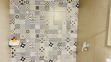 Shower, bidet, towels, soap