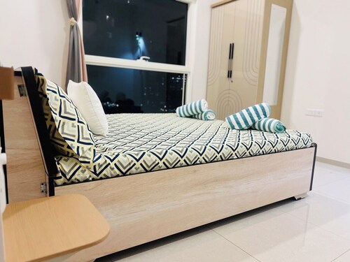 2-bedroom corporate suite with swimming pool, gym, wifi, AC