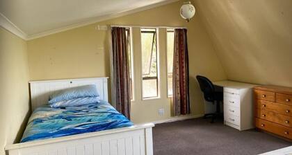 Room-tranquil Browns Bay Guest Rooms wit