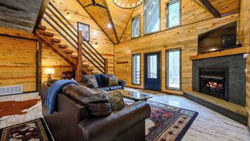 Chalet rustique, Plusieurs lits, baignoire à remous, vue sur la montagne (Drift Inn) | Aire de séjour