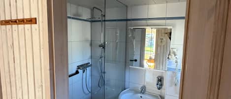 Shower, hair dryer, towels
