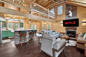 Living area - Family-friendly cabin with game room and backyard! (Hanover)