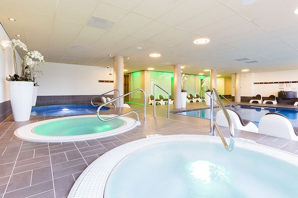 Slip into bubbling hot tubs and let stress melt away.