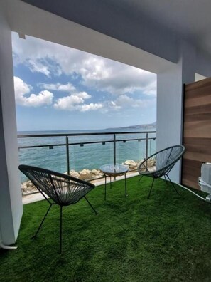 Standard Double or Twin Room, Balcony, Sea View | Property grounds - Chavalon Apartments (Kalyves)